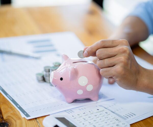 Close up of money stack coins and Dollar banknotes Saving money financial banking concept.